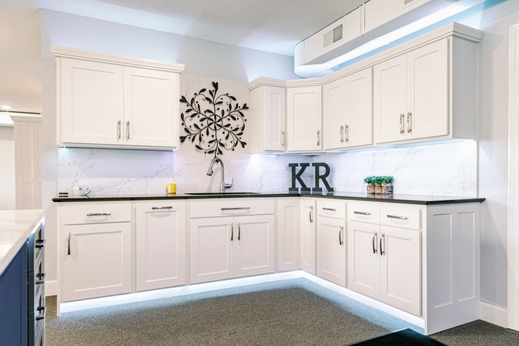 Custom kitchen island with soft-close drawers and contemporary pendant lighting