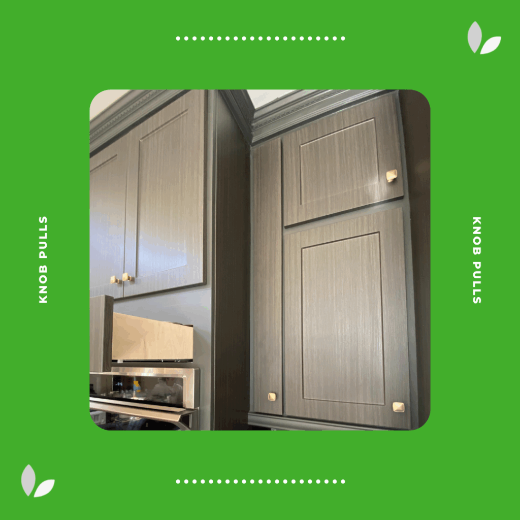 Golden champagne cabinet knobs on upper white cabinet doors, providing a simple, timeless accent in a transitional kitchen design.
