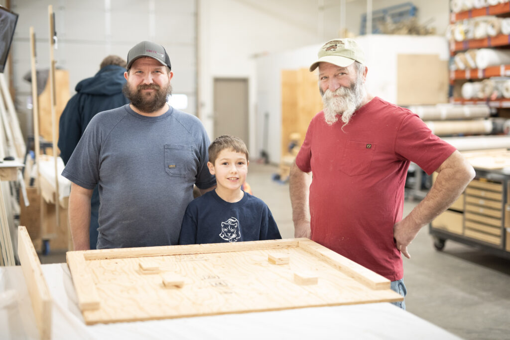 Cub Scouts assembling bat houses during hands-on building project